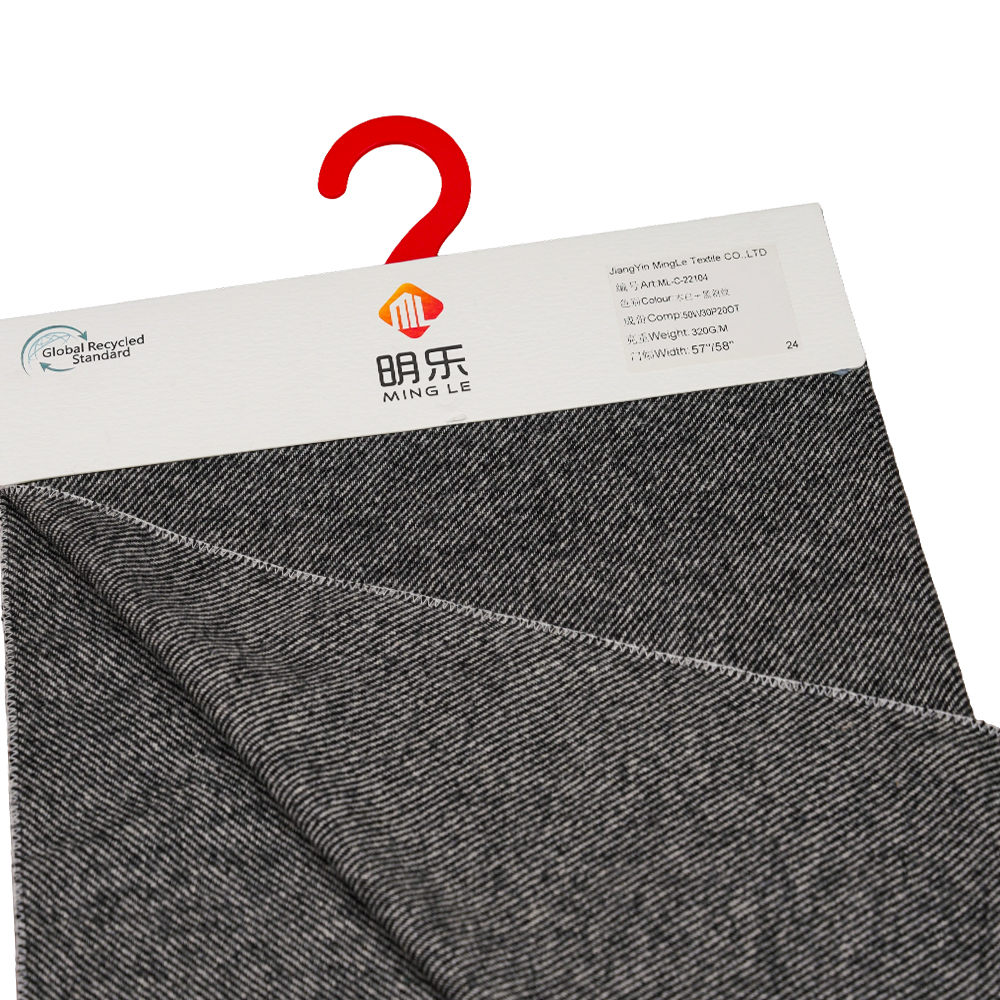 50 % laine, 30 % polyester, 20 % autres fibres, 320 G/M, blanc cassé + noir, tissu en flanelle sergé, ML-C-22104