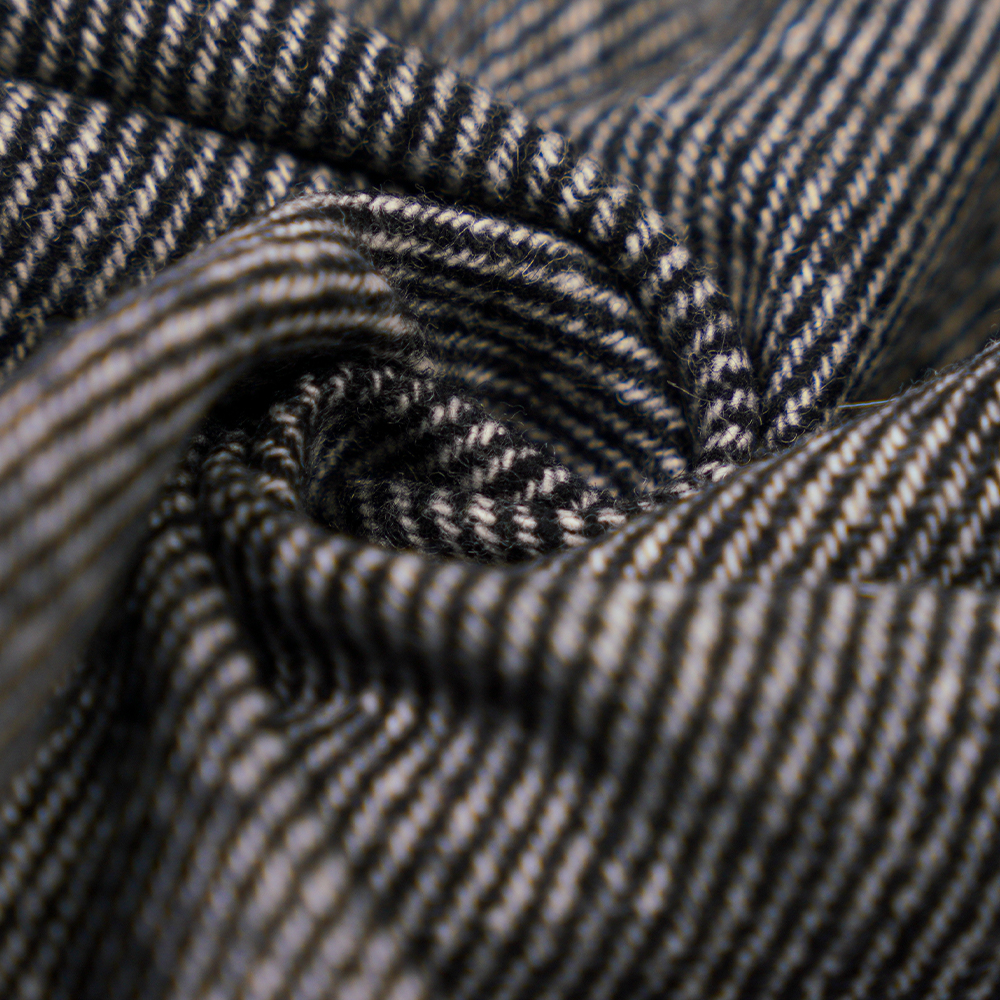 50 % laine, 30 % polyester, 20 % autres fibres, 320 G/M, blanc cassé + noir, tissu en flanelle sergé, ML-C-22104